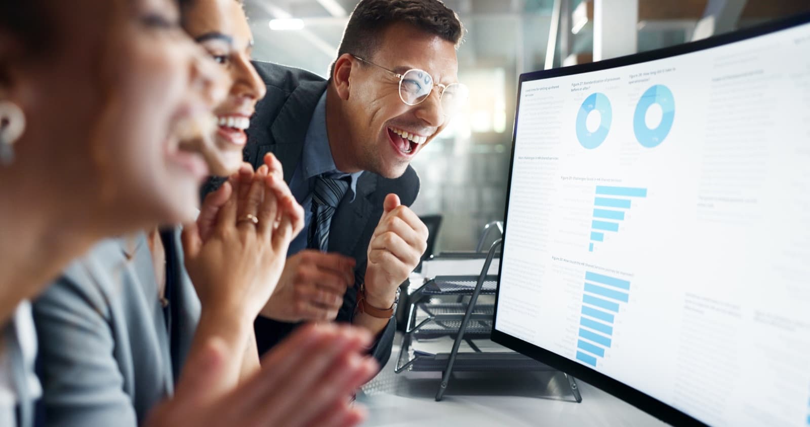 Finance team reviewing charts and accounting metrics